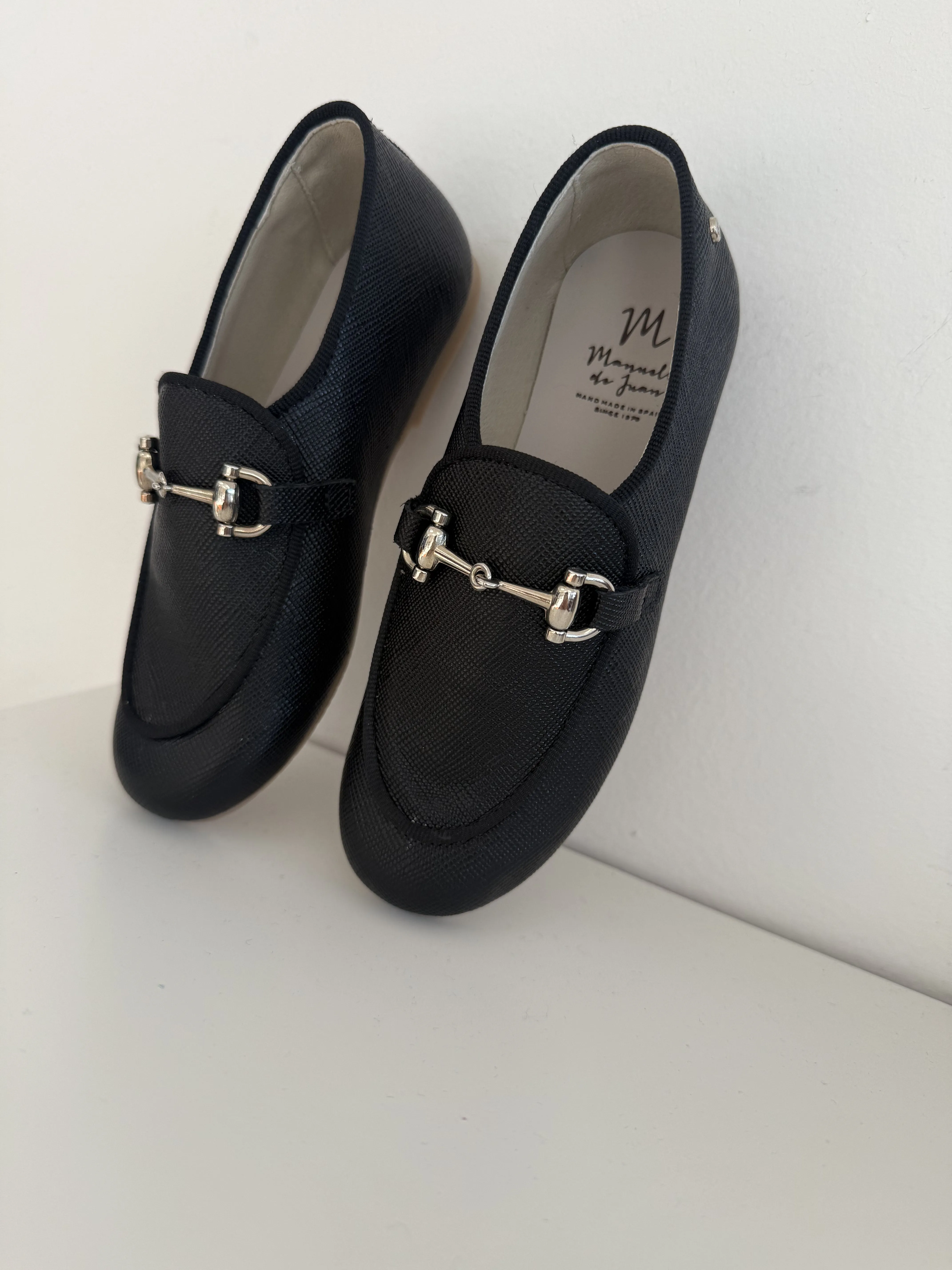 Manuela Black Textured Buckle Loafer